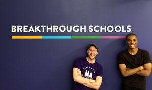 CEO Brian McAllester and Creative Director Terrance Reynolds, after hanging a custom made sign for Breakthrough Schools.